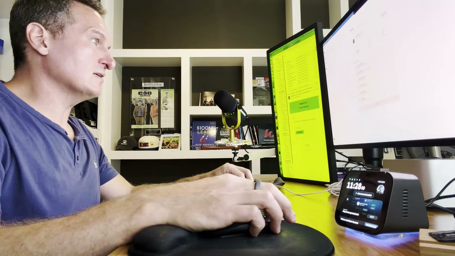 Jeff Sauer at his desk with the Violoop device plugged in next to his monitors